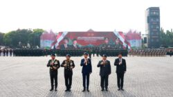 Jokowi and Prabowo Subianto Inspecting Troops at Presidential Inauguration Security Ceremony while Riding Together in Pindad Jeep