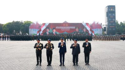 Jokowi and Prabowo Subianto Inspecting Troops at Presidential Inauguration Security Ceremony while Riding Together in Pindad Jeep